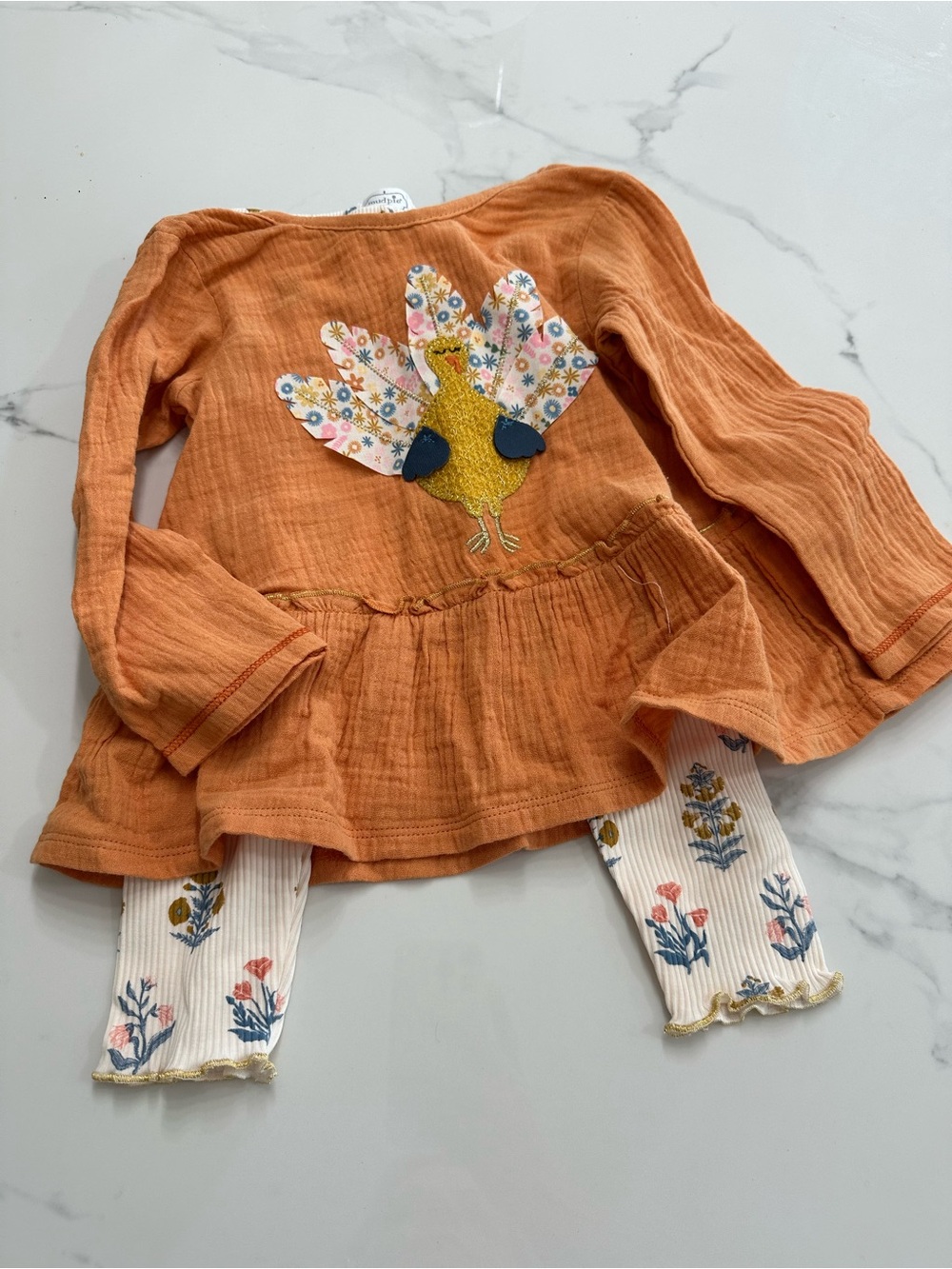 Mud Pie Cream Knit Baby Top with Blue and Mustard Floral Trim